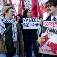 Amsterdam crowd protests US attack chanting no blood for oil