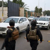 Iraqi security forces patrolling Baghdad streets due to Iraq security concerns