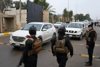 Iraqi security forces patrolling Baghdad streets due to Iraq security concerns