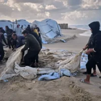 Gaza civilians cold weather brings cold nights in shelters