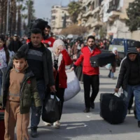 Civilians observe troop movements in Sheikh Maqsoud Ashrafieh