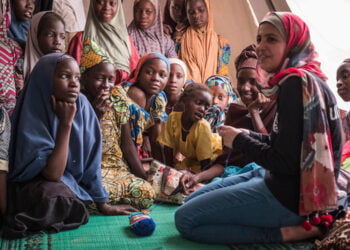 (right) Syrian refugee and education activist Muzoon Almellehan meets Nigeria refugee girls at a sewing workshop in Daresalam refugee camp, Lake Region, Chad, Thursday 20 April 2017.

More than 25 million children between 6 and 15 years old, or 22 per cent of children in that age group, are missing out on school in conflict zones across 22 countries. In response to the education crisis in Chad, UNICEF has since the start of 2017 provided school supplies to more than 58,000 students, distributed teaching materials to more than 760 teachers, and built 151 classrooms, 101 temporary learning spaces, 52 latrines and 7 sports fields. UNICEF Chad also supported the salaries of 327 teachers for the 2016-2017 school year.

To help drive an increased understanding of the challenges children affected and uprooted by conflict face in accessing school, UNICEF advocate Muzoon Almellehan, a 19-year-old Syrian refugee and education activist, travelled to Chad, a country where nearly three times as many girls as boys of primary-age in conflict areas are missing out on education.