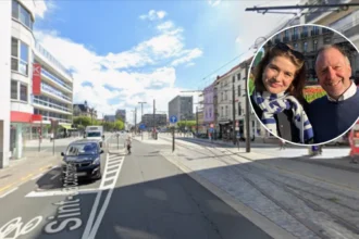 Antwerp residents queue for free tulips at Opera Square