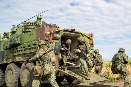 Taiwan latest news showing military vehicles participating in five-day combat readiness drills in Taiwan during 2026