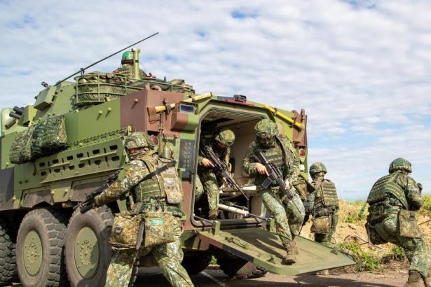 Taiwan latest news showing military vehicles participating in five-day combat readiness drills in Taiwan during 2026