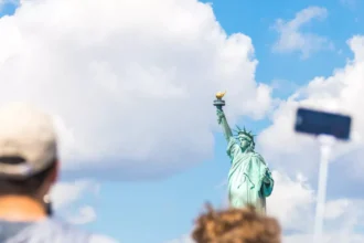 Belgians delay U.S. trips as costs and border rules tighten