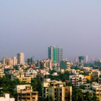 India corporate restructuring news highlighting Adani Group strategy and business realignment