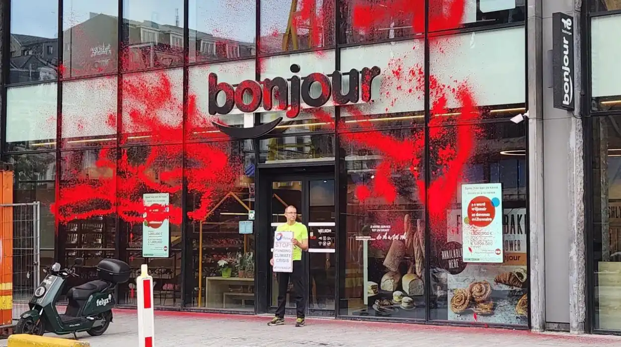 Brussels activist targets total energies HQ over EACOP protest