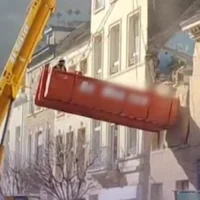 Brussels building facade collapses after crane accident