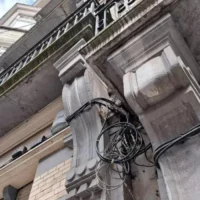 Brussels residents demand rules to curb unsightly telecom cables on historic building 