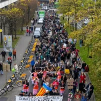 Brussels urges climate action as 750 protesters rally before COP29 in Baku