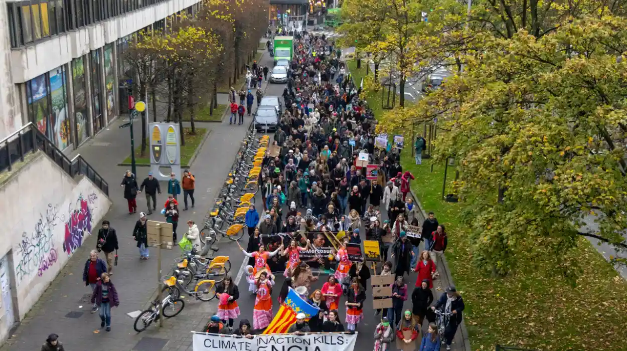 Brussels urges climate action as 750 protesters rally before COP29 in Baku