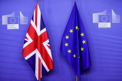 EU and UK flags representing negotiations over Made in Europe rules and industrial trade.