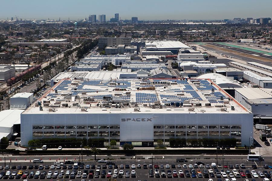 Corporate governance tech sector spotlight on SpaceX headquarters in Hawthorne after IPO filingz
