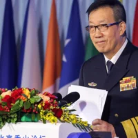 China's defence chief calls for unity to avoid jungle law