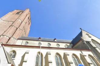 Clock faces restored on Sint-Trudokerk Tower in Peer