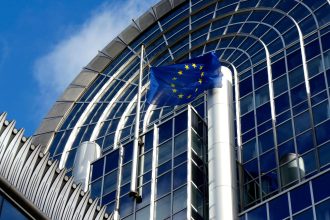 European Parliament building in Brussels representing EU diplomatic concerns over the Iran-US crisis.