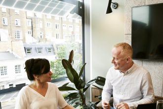 Entrepreneur reviewing UK startup registration documents before company formation