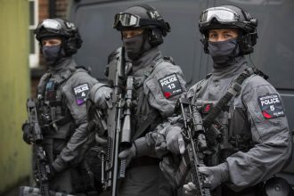 Counter Terrorism Policing officers conducting terrorism investigation