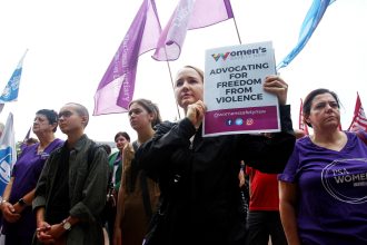 International Women’s Day rally promoting action to combat online abuse