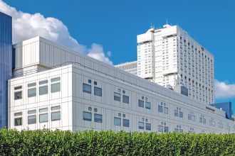 Hospital building in Belgium illustrating the Brussels hospital merger and expansion of public healthcare cooperation.