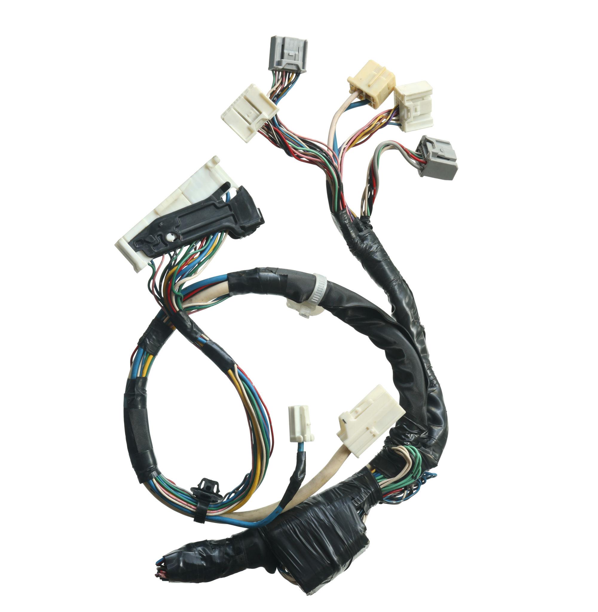 Technician inspecting affected vehicle under BMW vehicle wiring issue recall in United States