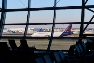 Brussels strike flight disruption illustrated by aircraft and airport facilities in Belgium.