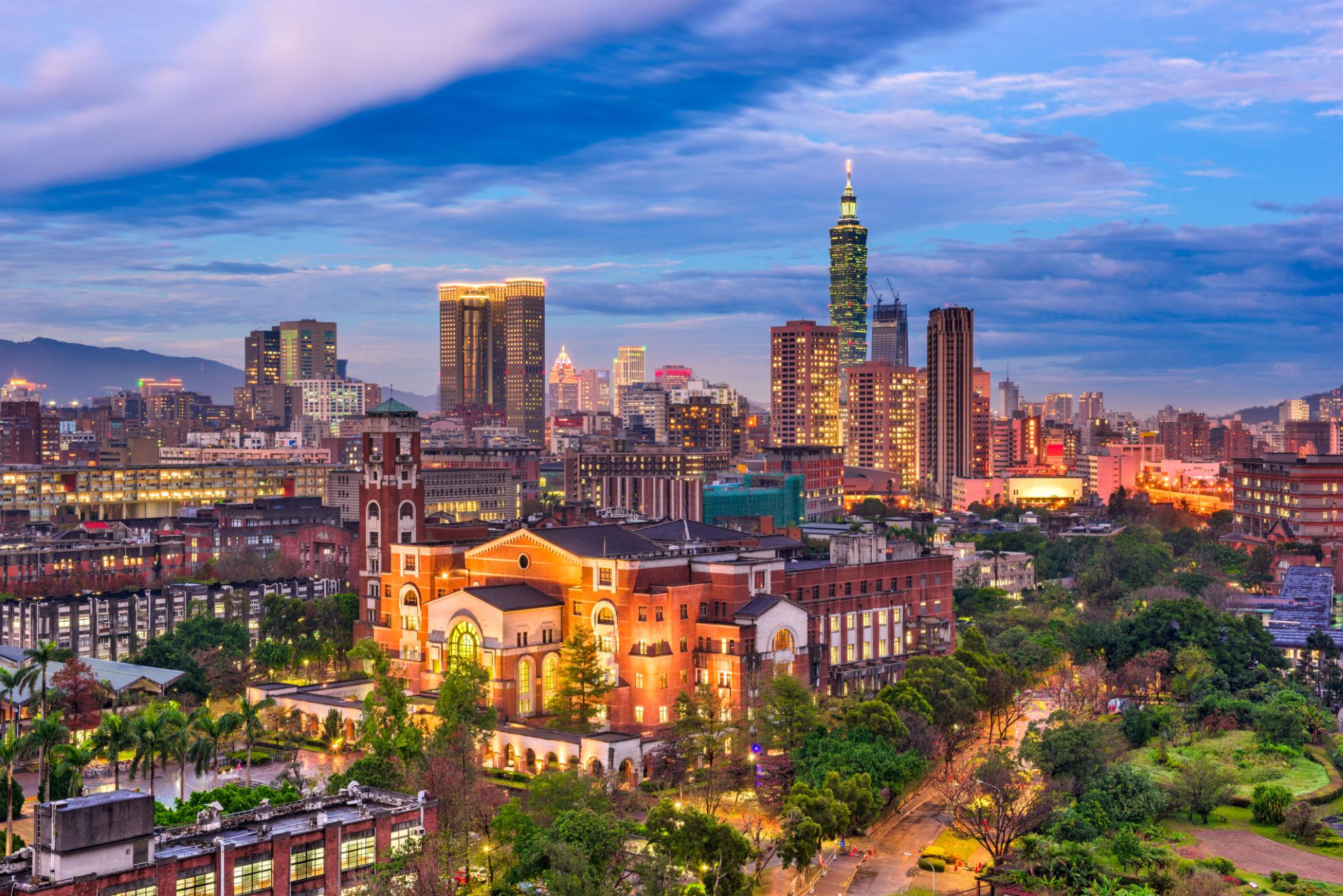 Taiwan geopolitical conflict Taipei skyline with national flag and government buildings 2026