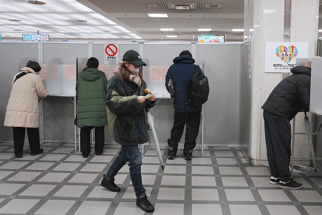 Voters participate during Japan election results process