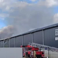 Fire at Lokeren waste plant, firefighters flame conflict