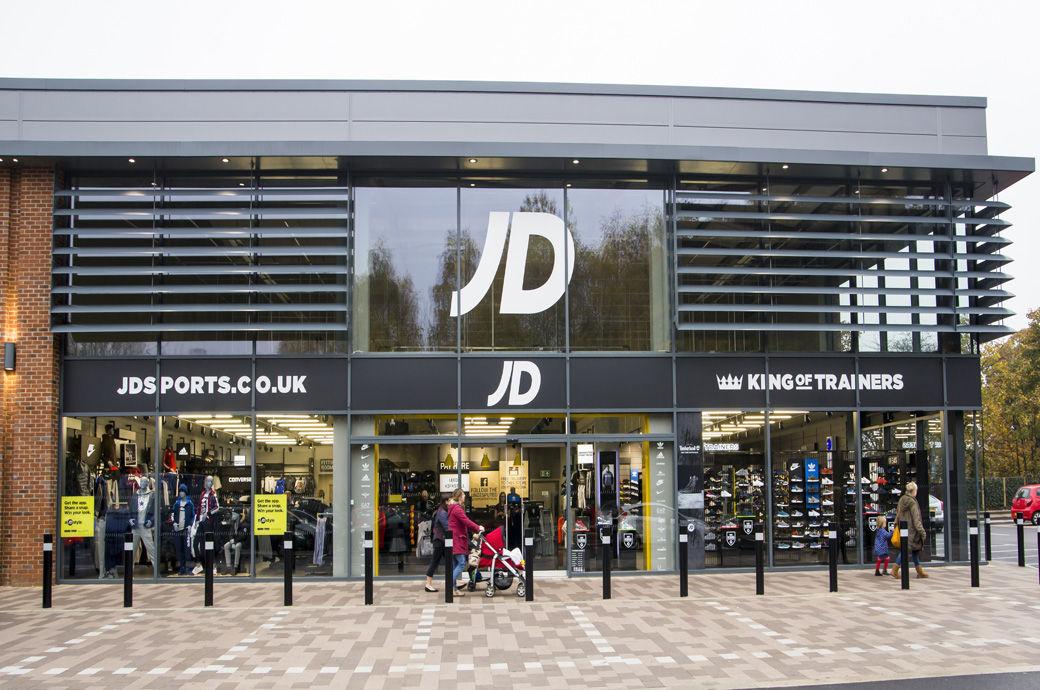 Corporate leadership meeting reflecting global retail expansion UK strategy shift