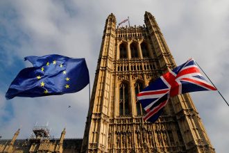 UK and EU flags symbolising post-Brexit immigration challenges facing couples and families.