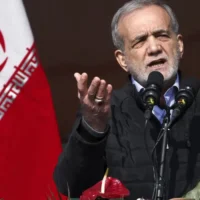 Iran's president announces suspension of ties with IAEA