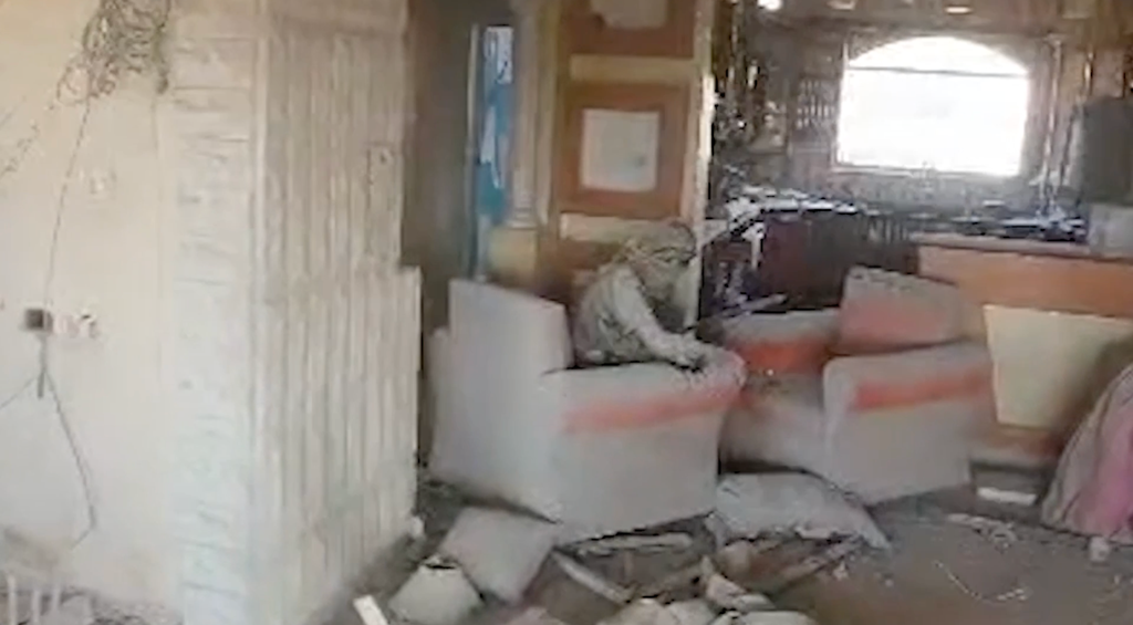 Israeli military identified as Yahya Sinwar sitting in a chair