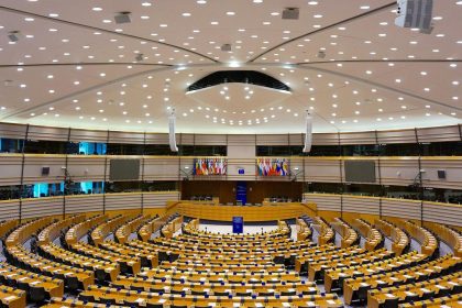 European elections and EU policy changes represented by the European Parliament chamber in Brussels.