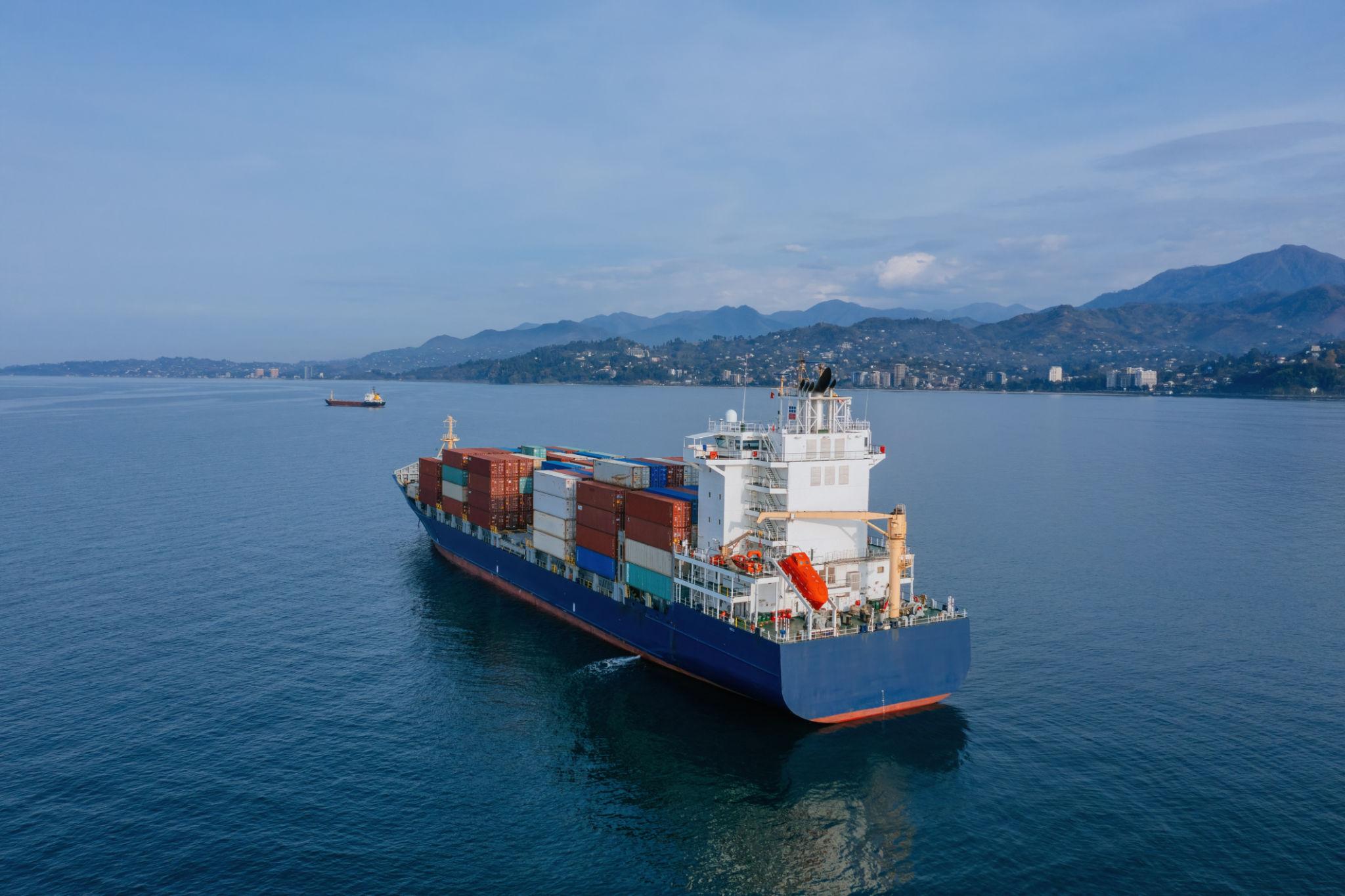 Aerial view of a cargo ship near Georgia illustrating shipping risks linked to Black Sea drone attacks.