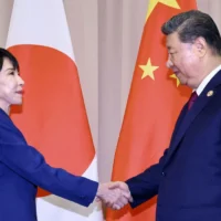 Japan urges China to take steps after it warned citizens on Japan visits