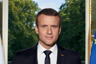 President Emmanuel Macron faces political pressure during the France protest crisis.