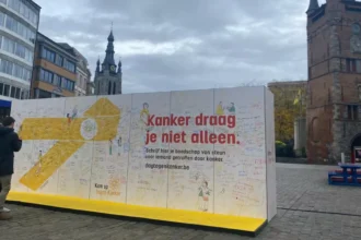 Kortrijk's support wall 'Kom op tegen Kanker' for cancer awareness inspires community