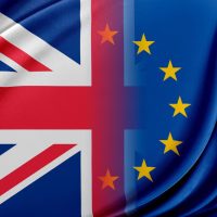 UK and EU flags symbolizing debate on Britain returning to EU