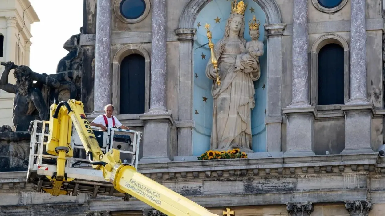 Madonna statue decorated with sunflowers for annual procession in Antwerp
