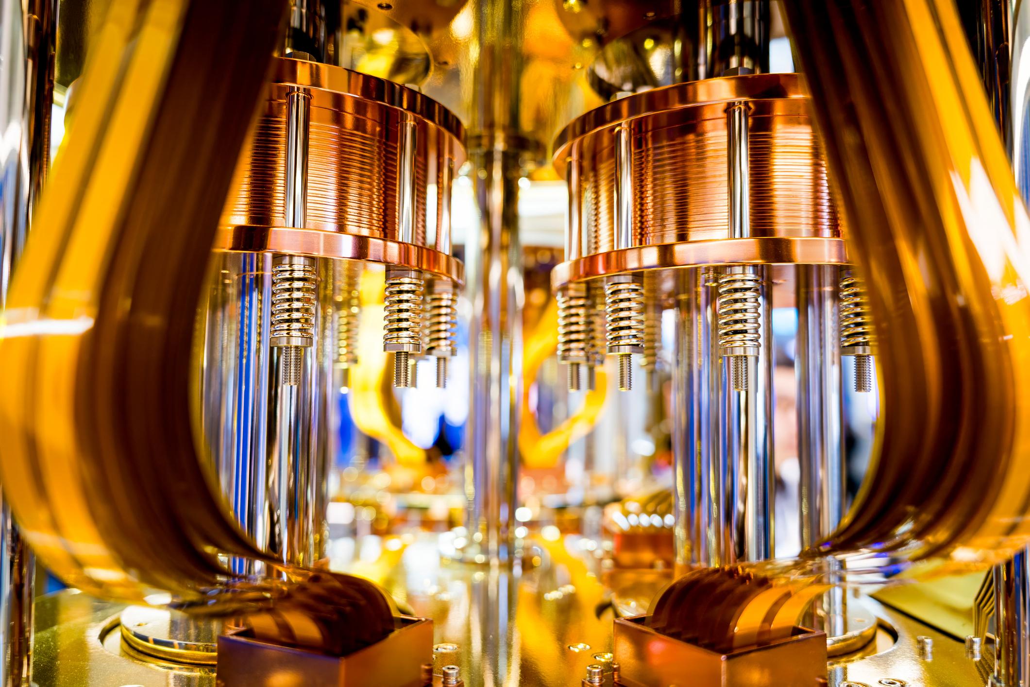 Engineers working on quantum computing investment projects inside research facility
