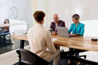 HR managers interviewing candidates as Business credibility attracts top talent