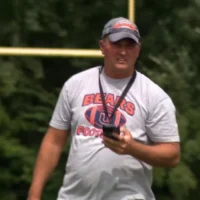 Missing Virginia football coach is wanted on child pornography and other charges, police say