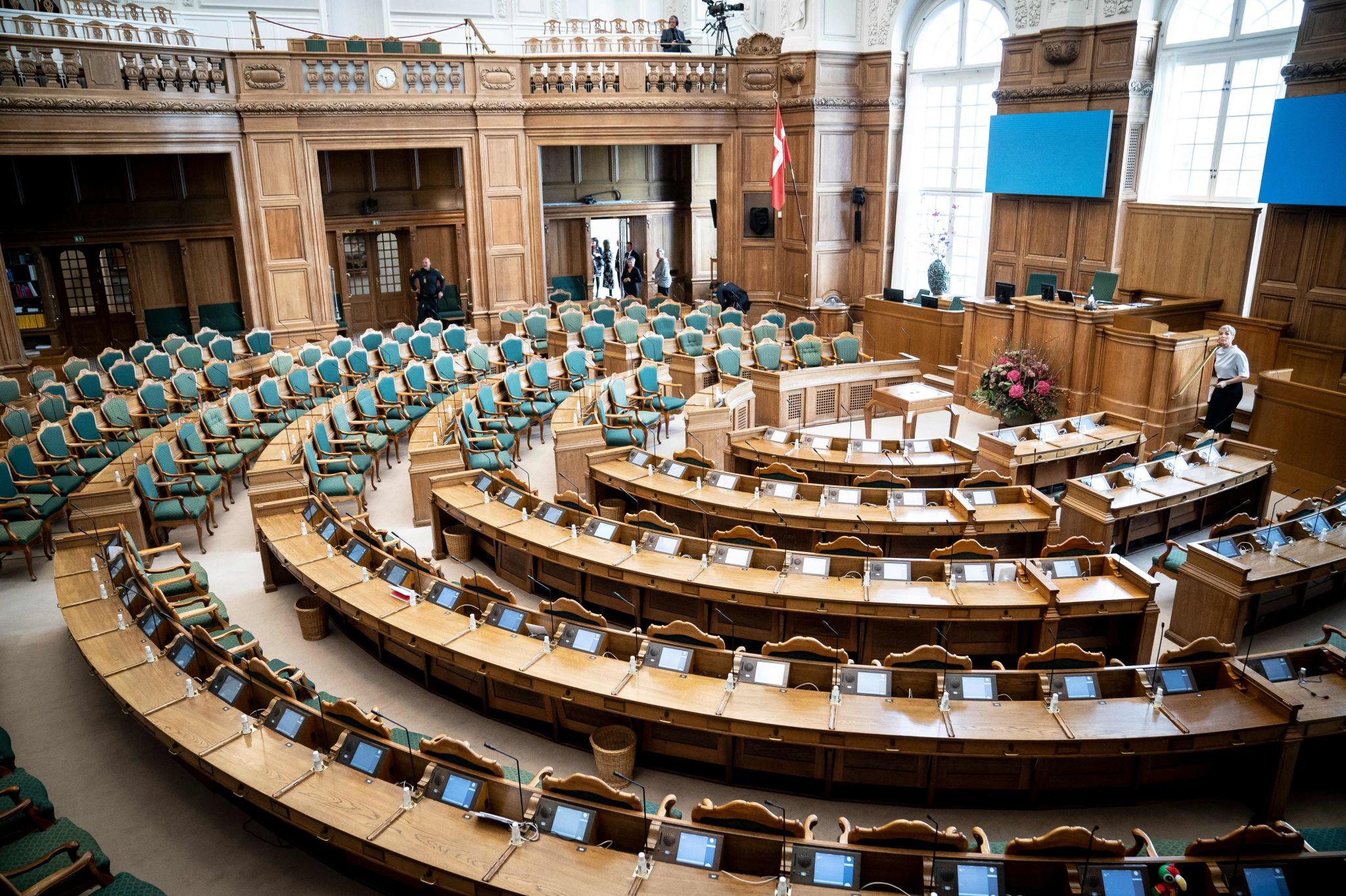 Danish Parliament session discussing priorities of the Denmark coalition government