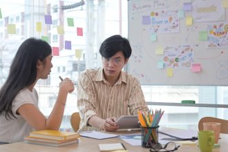 Entrepreneurs creating a business growth strategy before company registration