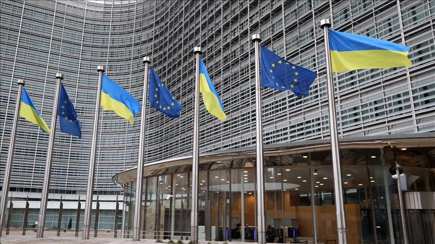EU defence readiness as EU and Ukrainian flags fly outside the European Commission in Brussels