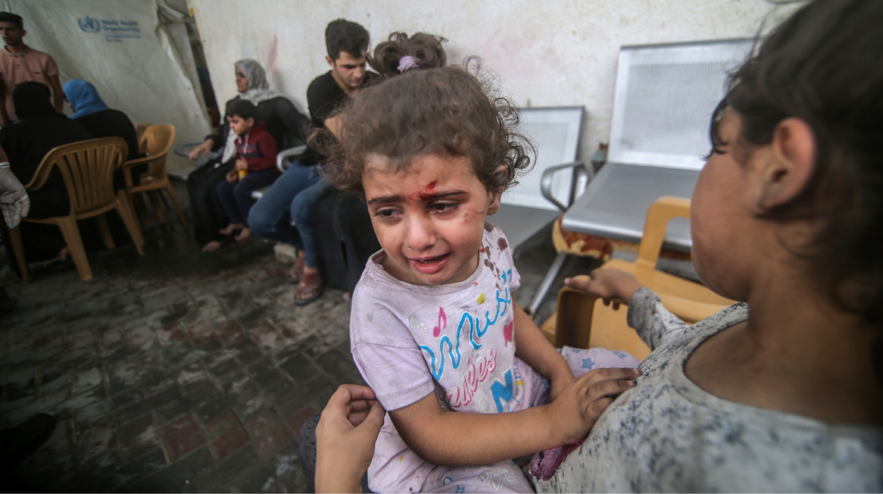 Palestinians evacuate wounded after an Israeli airstrike in Rafah refugee camp, southern Gaza Strip,