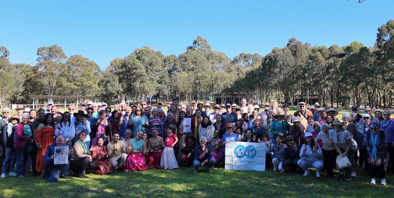 Candle memorial symbolizing Sydney unity message