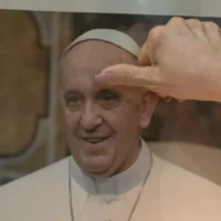 Pope Francis hospitalized in Rome, denies resignation